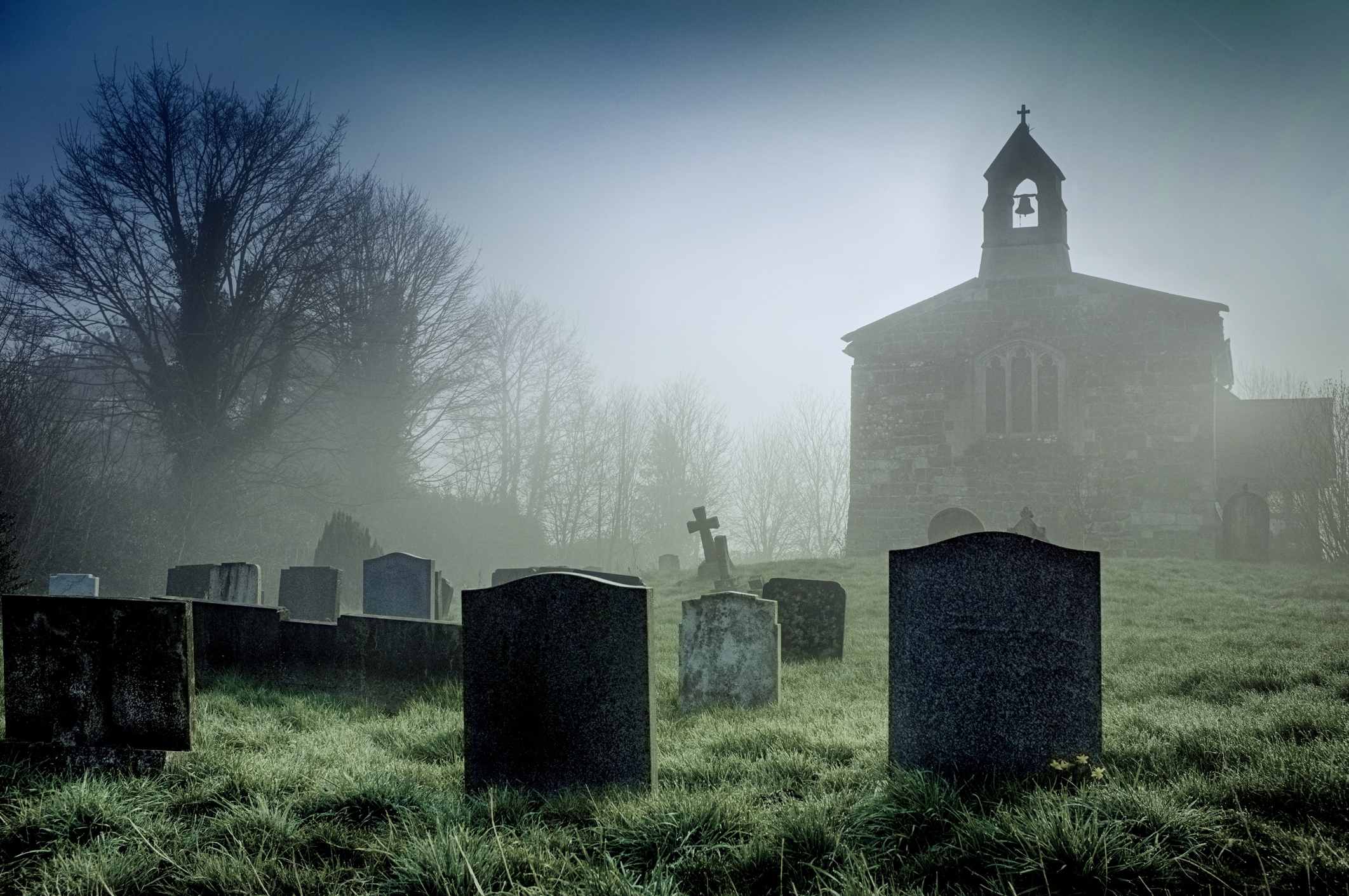 A misty dawn at a deserted church on the Lincolnshire Wolds, England.