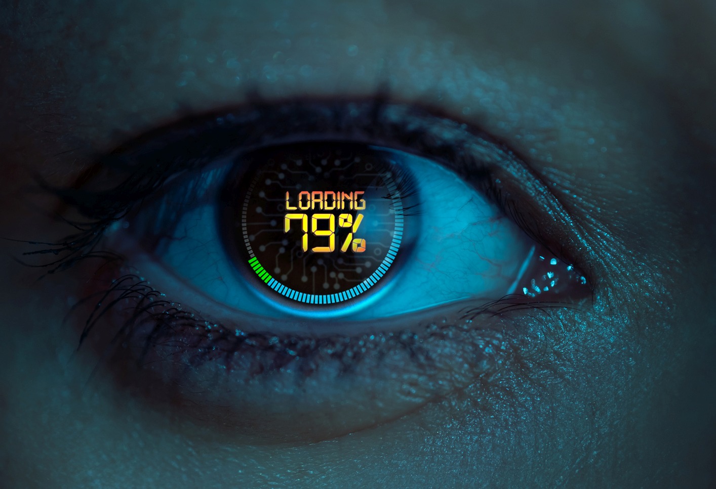Closeup of human eye with digital readout saying LOADING 79%