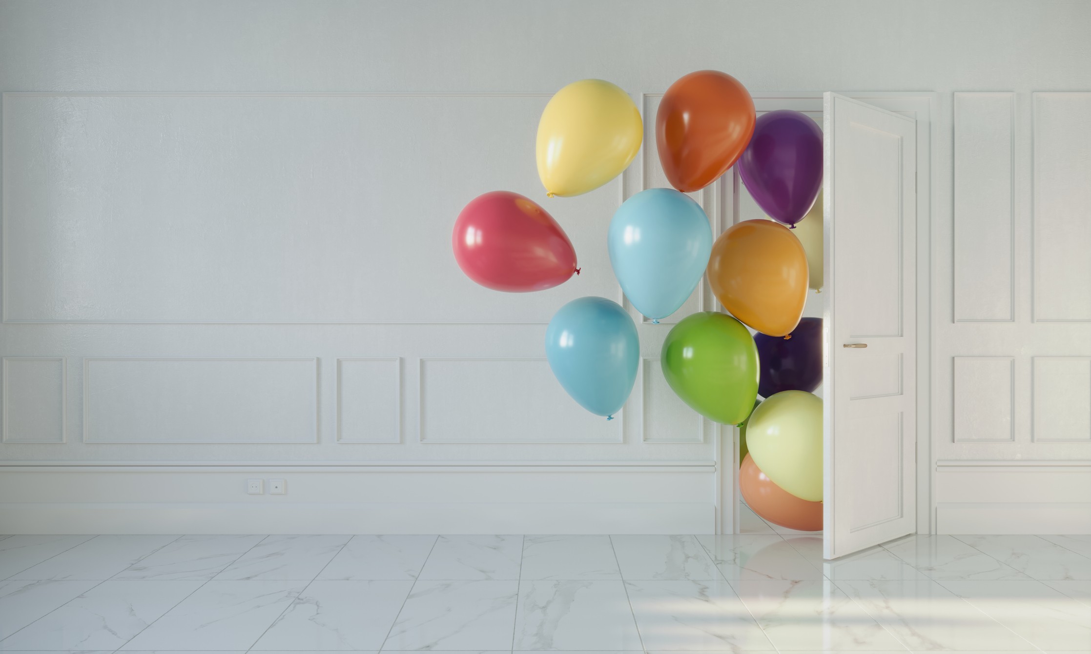 Room with opening door and multi colored balloons entering.