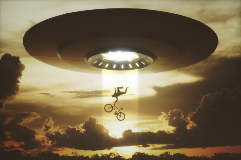 People levitating into an alien ship.