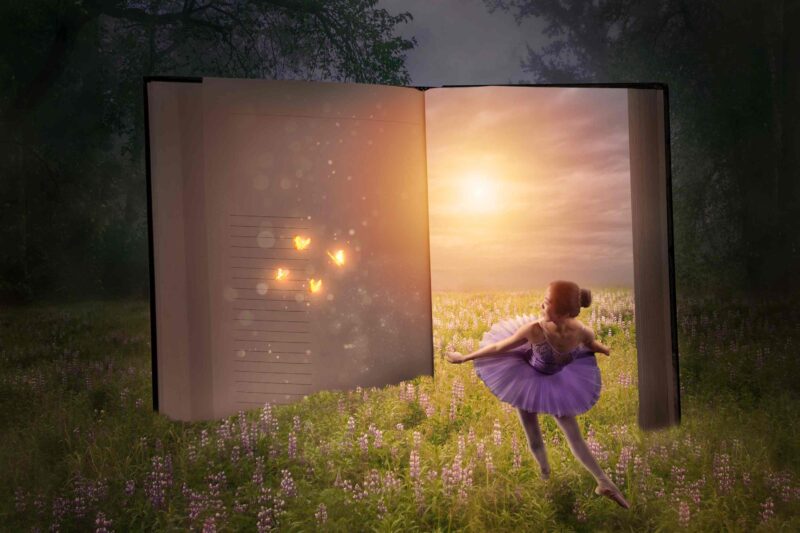 Story book opens up to a dancing ballerina in a fantasy forest setting with glowing butterflies and fairy tale meadow. 