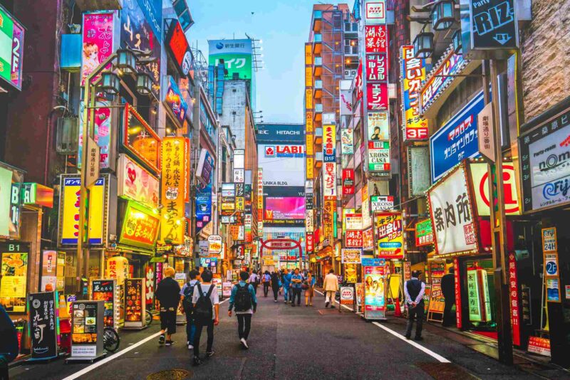 Kabukicho pass illuminated at night in Shinjuku district, Tokyo. The area is a commercial an entertainment zone
