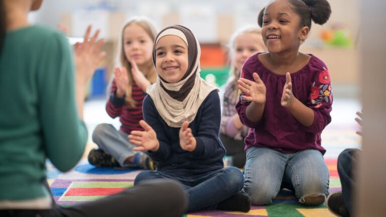 Photo of diverse children in classroom