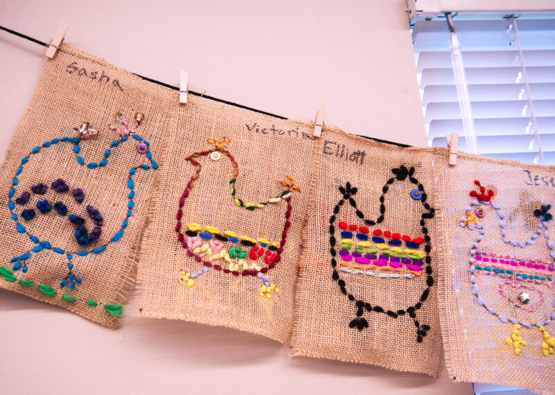 3rd Grade Art – Basic Sewing Sampler Simple embroidery samplers stitched on burlap showing the outline of a chicken